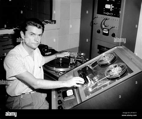 Sam Phillips Sits At The Controls Of His Recording Equipment At Sun