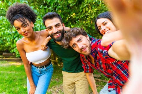 Premium Photo Cheerful Friends Taking Selfie In Back Yard