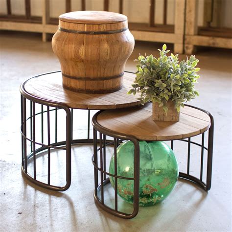 Taking their cue from rustic influences, the Farmer's Barrels Nesting Tables are timeless yet ...