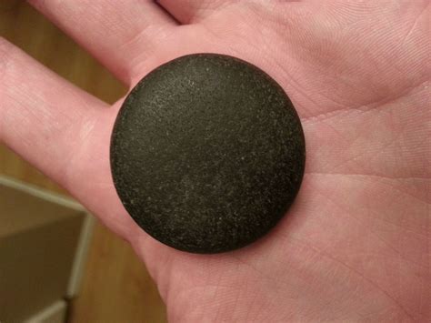 A Perfectly Smooth Round Rock Found On The Beach In Iceland Beach