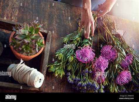 Every Flower Is A Soul Blossoming In Nature A Pretty Floral Bouquet Being Completed On A Wooden