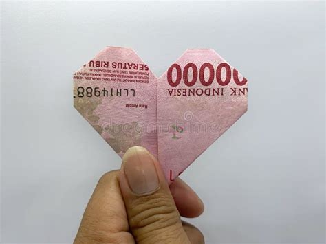 Alguien Sostiene A Mano Billetes Indonesios Rupias Sobre Fondo