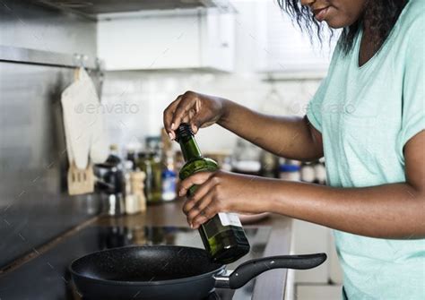 Black Woman Cooking In The Kitchen Cooking Kitchen Cooking Oils