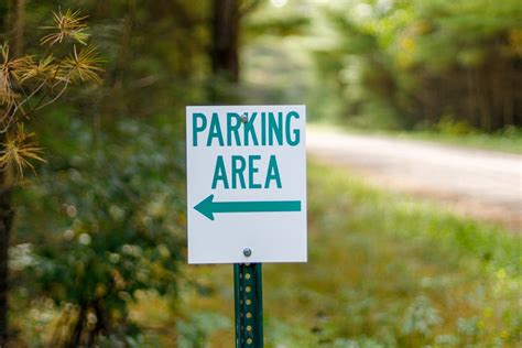 Sign to Parking Area · Free Stock Photo