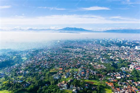 beautiful bandung cityscape  crowd houses premium photo