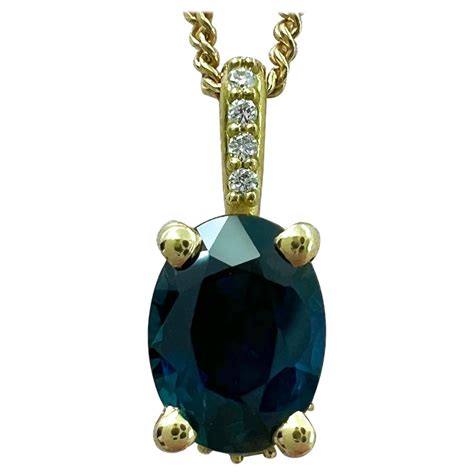 1ct Deep Blue Sapphire And Diamond 18k Yellow Gold Hidden Halo Pendant