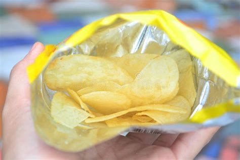 Close Up Opened Bag Of Potato Chips Stock Image Image Of Fried Table