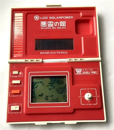 VINTAGE 1982 BANDAI EVIL MANSION Clamshell Solar LCD Game Very Good