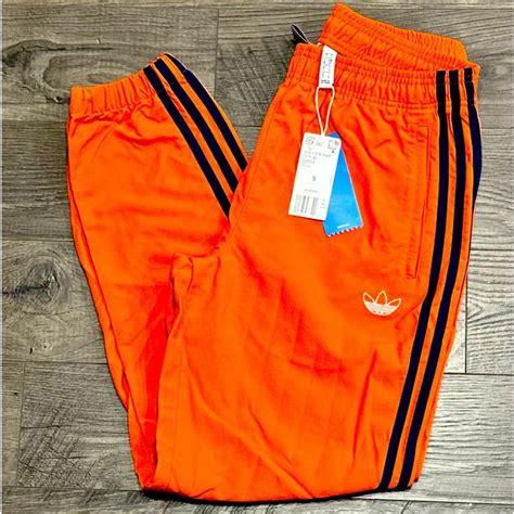 Adidas Sweatpants In 2024 Orange Shorts Outfit Mens Shorts Outfits Adidas Sweatpants