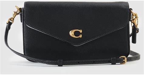 Coach Leather Wyn Cross Body Bag In Black Save Lyst