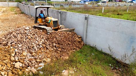 Old Dozer But Pushing Spreading Stone By Skills Operator Making Smooth