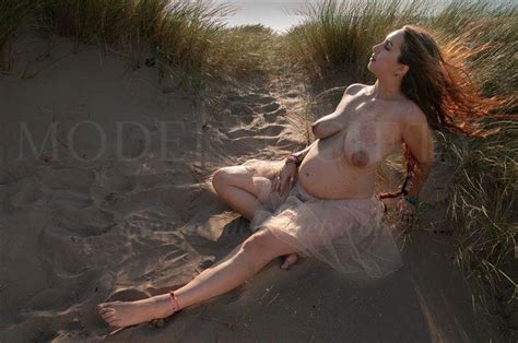 Omani Pregnant In The Sand Dunes Wind Blowing Her Hair Artistic Nude