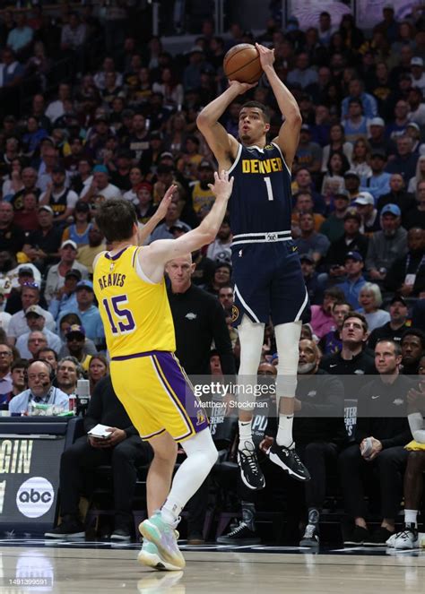 Michael Porter Jr 1 Of The Denver Nuggets Shoots Over Austin Reaves