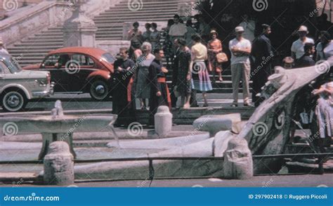 Tourists Visiting The Fontana Della Barcaccia In Rome In The 1960s