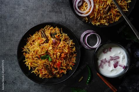 Homemade indian Vegetable / veg biryani with mixed veggies served with ...