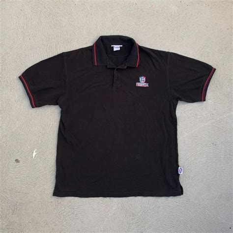 2000’s Vintage Fremantle Dockers AFL black purple... - Depop