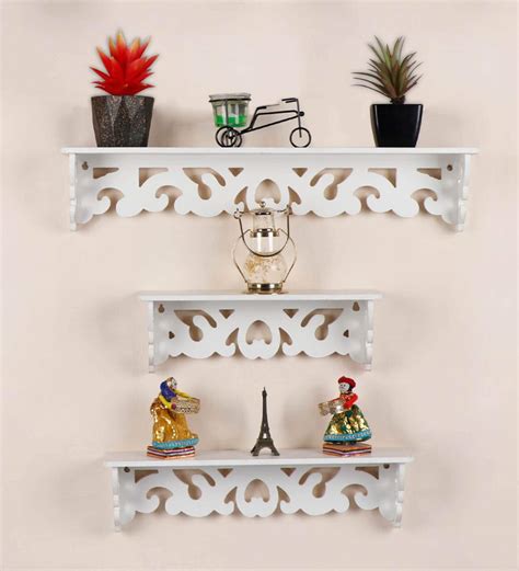 Buy Engineered Wood Hand Carved Wall Shelf In White At 14 OFF By