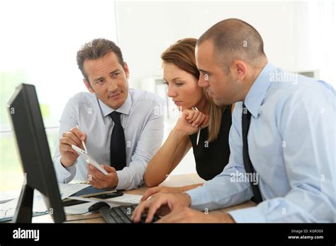 Business People Working On Desktop Computer Stock Photo Alamy