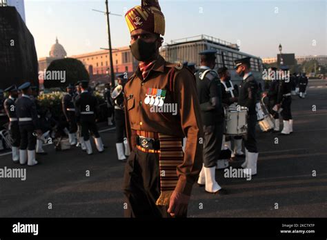 An Indian Armed Force Personnel Reacts To Camera After The Beating