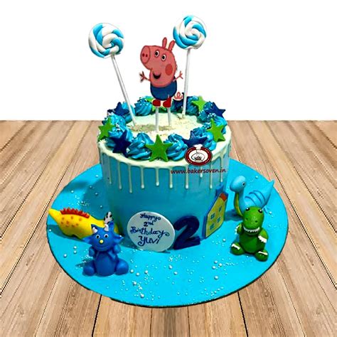 Peppa Pig & dinosaur cake