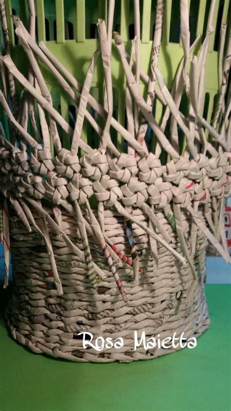 A Wicker Basket Sitting On Top Of A Green Table