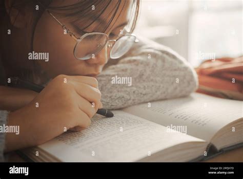 Boring Student Girl Lying On Book And Reading Book Student Girl At