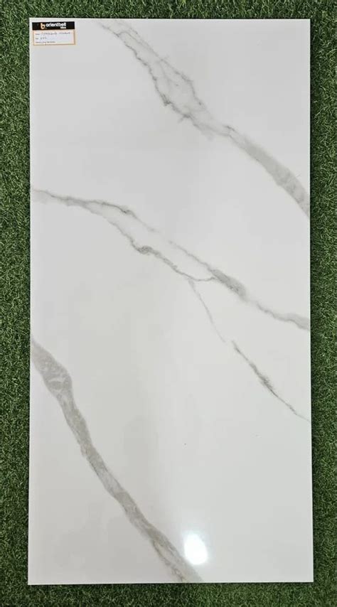 Glossy Vitrified Orientbell Pgvt Statuario Natura Floor Tiles At Rs 65