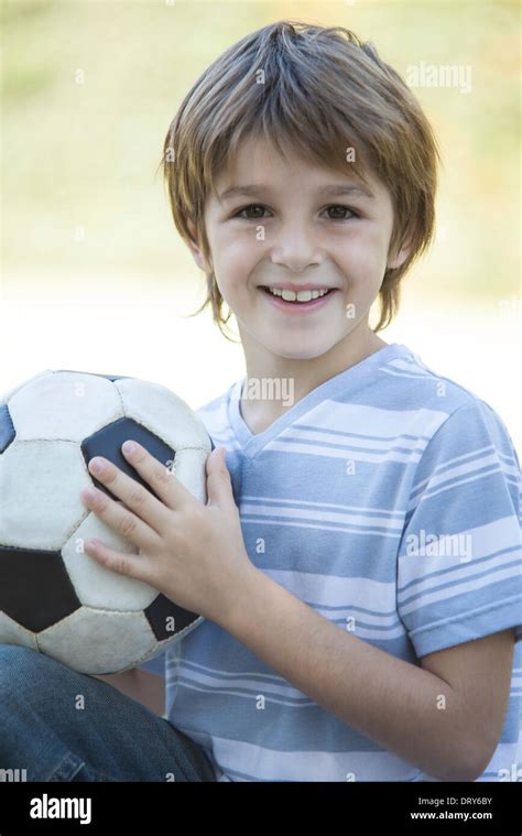 Boy Holding Soccer Ball Portrait Stock Photo Alamy