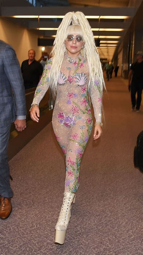 Lady Gaga Fashions Crazy Hair And See Through Suit As She Arrives In