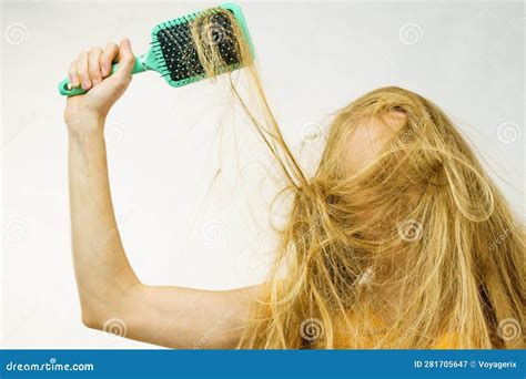 Blonde Girl Long Tangled Hair Holds Brush Stock Image Image Of Damage Combing 281705647