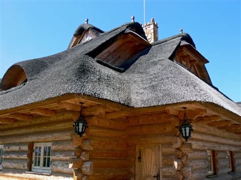 Wooden Thatched House - Close Up Stock Image - Image of blue, light ...