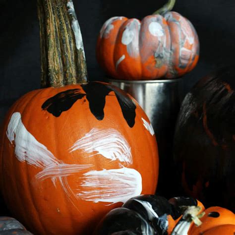 Painting Pumpkins With Kids Is The Perfect Halloween Sensory Activity