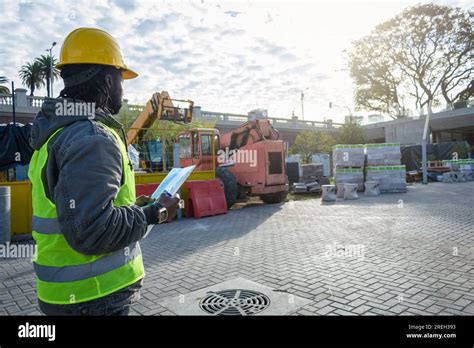 Rear View Of Young Black Man Of African Ethnicity Construction Worker