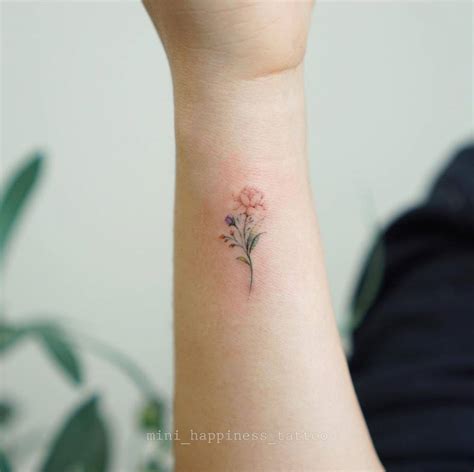 Flower Bouquet Tattoo Located On The Wrist Watercolor