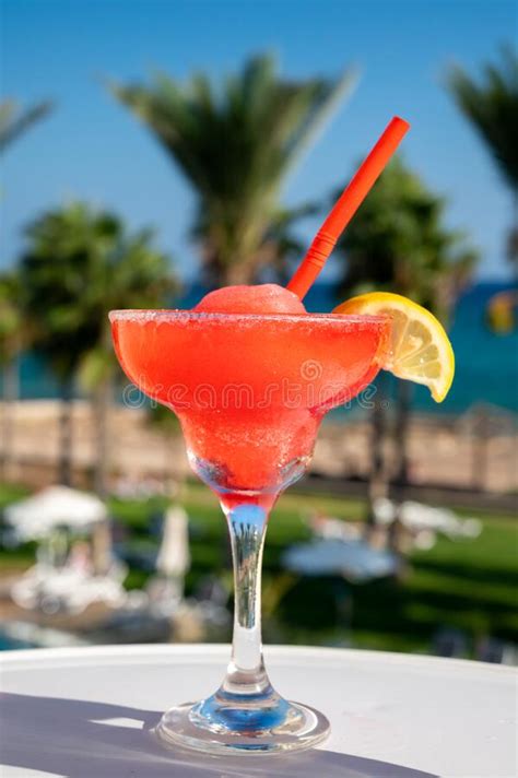 Colourful Cold Strawberry Daiquiri Cocktail Drink Served In Glass At