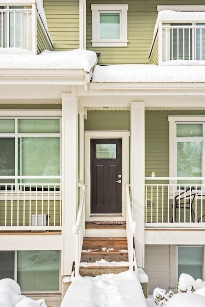 Premium Photo | Entrance of residential house on winter season in canada