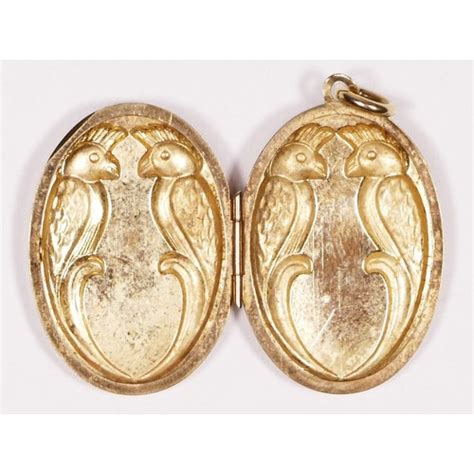 A Ct Gold Two Colour Oval Locket Unmarked With Two Love Birds Front