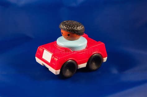 Figurine Of A Driver In A Toy Car Stock Image Image Of Driving Wheel