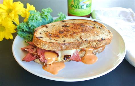 Tasty Reuben Pastrami on Rye Bread Sandwich - No Plate Like Home