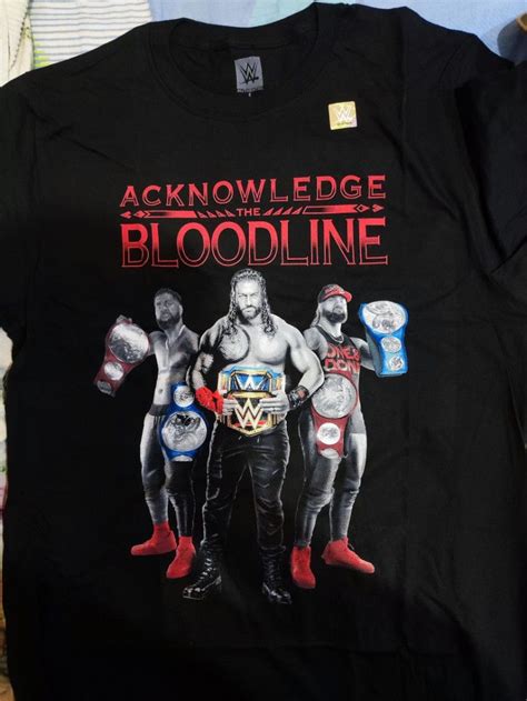 WWE Bloodline tee. Usos Roman Reigns, Men's Fashion, Tops & Sets, Tshirts & Polo Shirts on Carousell