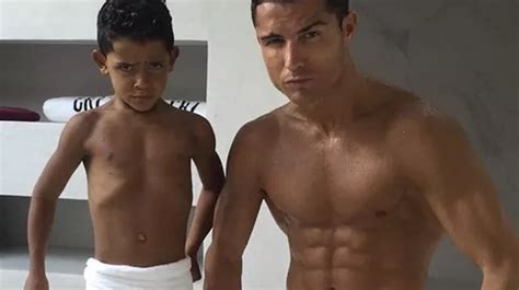 Cristiano Ronaldo shows off six-pack while his son pulls a matching ...