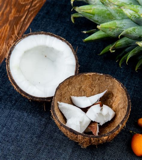 Free Photo Close Up View Of Citrus Fruits As Half Cut Coconut With