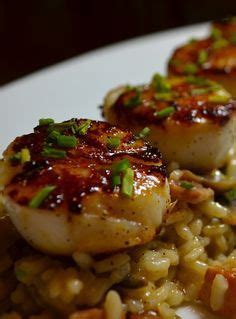 Seared Scallops with Creamy Risotto Skillet seared fresh sea scallops served over cooked creamy ...