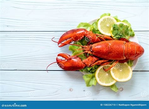 Boiled Lobster With Vegetable And Lemon Stock Photo Image Of Claw