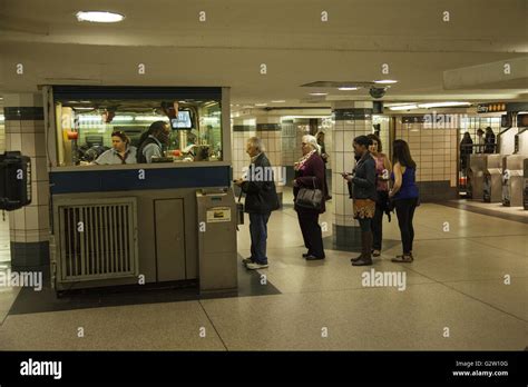subway ticket booth     lines  midtown manhattan stock