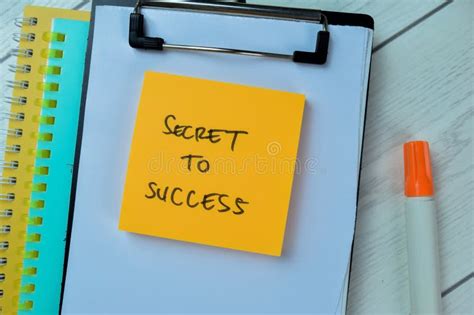 Concept Of Secret To Success Write On Sticky Notes Isolated On Wooden