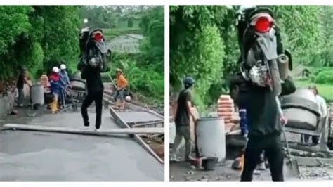 Agak Laen Pria Ini Panggul Motornya Karena Takut Jalan Yang Dicor