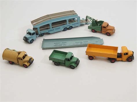 Lot 162 - A group of DINKY trucks and articulated