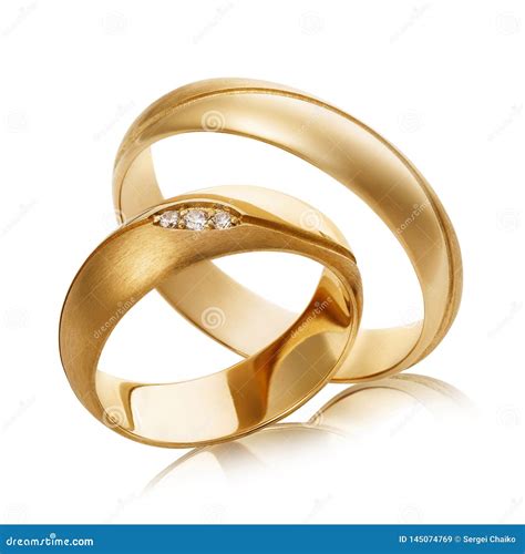 Two Gold Wedding Rings With Diamonds Isolated On White Background Stock