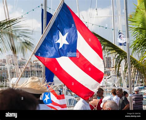 Cuban Crew Carrying Cuban Flag At Parade Ahead Of Arc Transatlantic